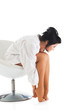 Portrait of the sexual woman in a man's shirt, on white