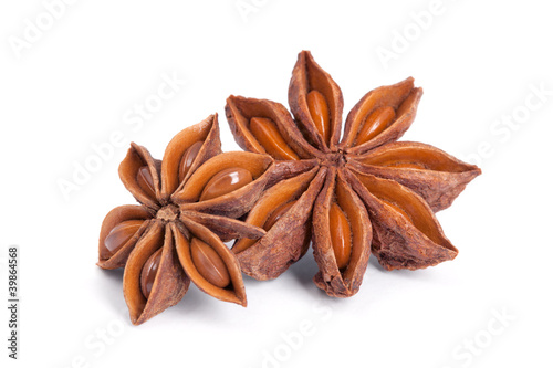 Photo: Anise star (Illicium verum) isolated on white background. Anise star (Illicium verum) isolated on white background.