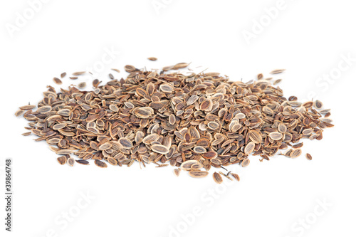 Photo: Pile Fennel seeds (Anethum graveolens) isolated on white Pile Fennel seeds (Anethum graveolens) isolated on white