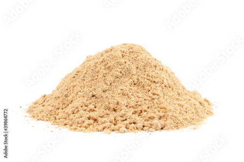 Photo: Pile of Ground Ginger (Zingiber officinale) isolated on white ba Pile of Ground Ginger (Zingiber officinale) isolated on white ba