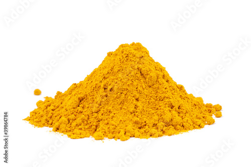 Photo: Heap ground Curry (Madras Curry) isolated on white background. Heap ground Curry (Madras Curry) isolated on white background.