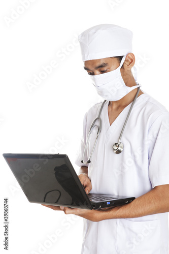 Photo: Surgeon with computer laptop Surgeon with computer laptop