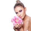 Photo: portrait of a beautiful delicate woman with flower portrait of a beautiful delicate woman with flower