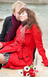 Dating couple sitting on a bench
