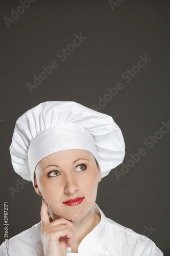 Photo: Chef woman having an idea Chef woman having an idea