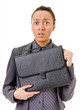 Terrified young business woman on white