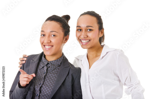 Photo: carelessness. two beautiful women looking at the camera carelessness. two beautiful women looking at the camera