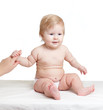baby with mothers finger