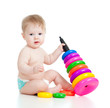 adorable baby playing with color toy