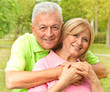 happy senior woman and man