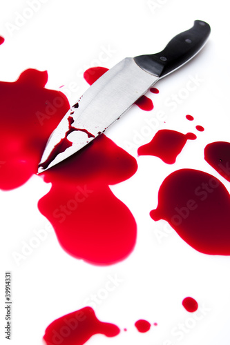 Photo: bloody knife with blood splatter bloody knife with blood splatter