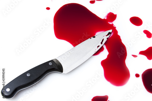 Photo: bloody knife with blood splatter bloody knife with blood splatter