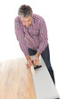 Worker assembling laminate floor