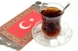 Turkish tea with traditional crystal tea glass and turkish flag Turkish tea with traditional crystal tea glass and turkish flag