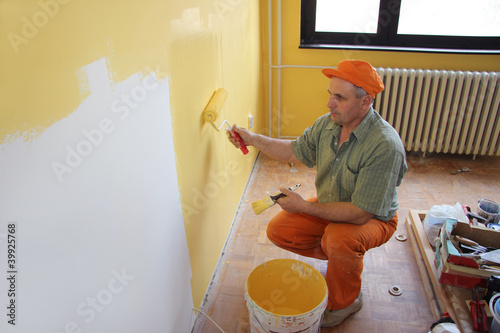 Photo: Painter in action Painter in action