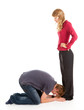 young man and woman, he kneeling before she