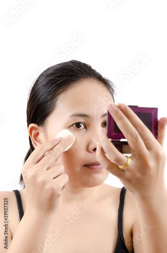 Photo: Close up Asian young woman make up. Close up Asian young woman make up.