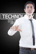 Businessman pushing Technology word on a touch screen interface.