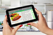 Foto: cooking recipe on the tablet-pc cooking recipe on the tablet-pc