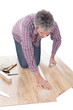 Worker assembling laminate floor