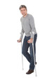 Senior man walking using crutches