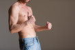 Athletic male body against