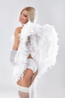 beautiful woman smiling with angel wings on the back