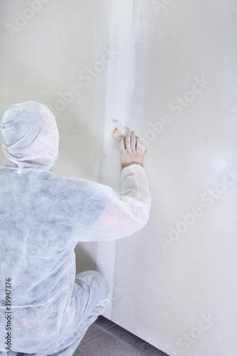 Photo: contractor plasterer working contractor plasterer working