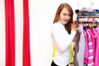 Young woman inside a store buying clothes