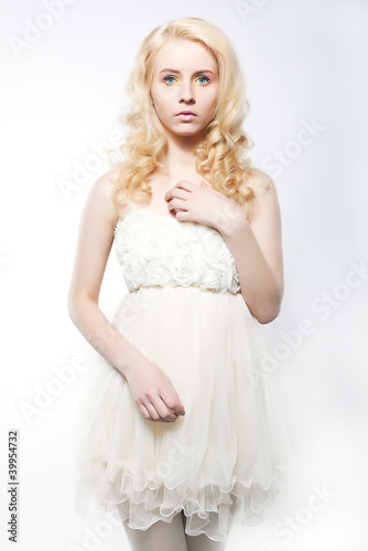 Photo: Beauty fresh blonde woman with beautiful blue eyes Beauty fresh blonde woman with beautiful blue eyes