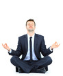 businessman meditating in yoga lotus pose on floor