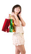 Happy young woman with shopping bags
