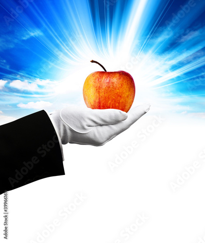 Photo: red apple in hand red apple in hand