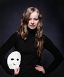 Low key portrait of a beautiful girl with mask Low key portrait of a beautiful girl with mask