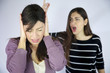 Photo: Girl closing her ears to not listen to shouts Girl closing her ears to not listen to shouts