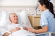 Nurse and male patient in UK Accident and Emergency