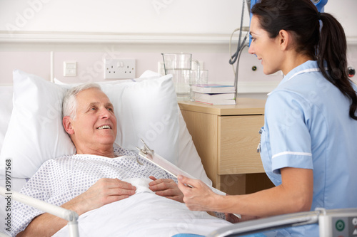 Photo: Nurse and male patient in UK Accident and Emergency Nurse and male patient in UK Accident and Emergency