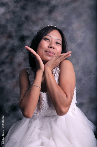 Photo: women in white dress bride in studio light women in white dress bride in studio light
