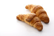 Foto: two croissants on white background two croissants on white background