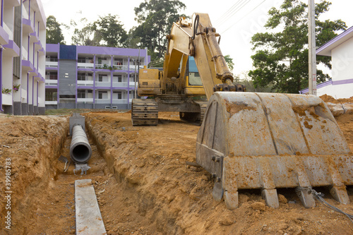 Photo: Digging drains to prevent flooding Digging drains to prevent flooding