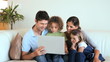 Family using a laptop together