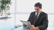 Video: Man in suit reading the news Man in suit reading the news
