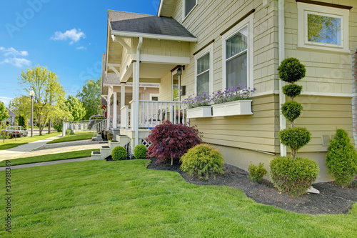 Photo: Beautiful American small house exterior. Beautiful American small house exterior.
