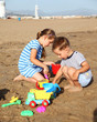Photo en ligne au meilleur prix Kids playing on the beach