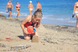 Child playing on the beach