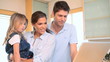 Video: Parents with a little girl using a laptop Parents with a little girl using a laptop
