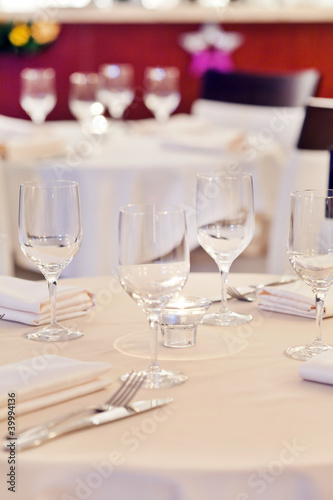 Photo: Tables set for meal Tables set for meal