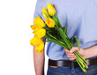 Man's back with yellow tulips