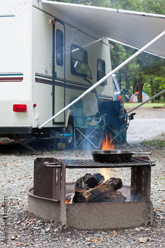 Photo: Cooking at a Campsite Cooking at a Campsite
