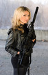 Pretty woman holding a gun